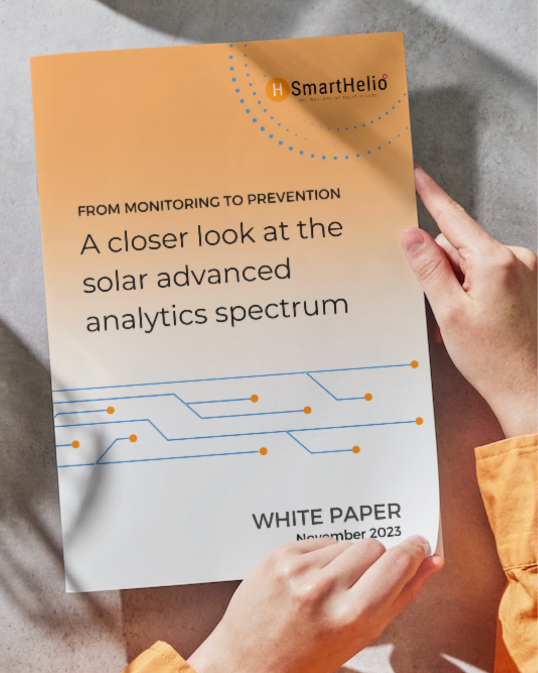 White paper held in two hands — From monitoring to prevention: a closer look at the solar advanced analytics spectrum