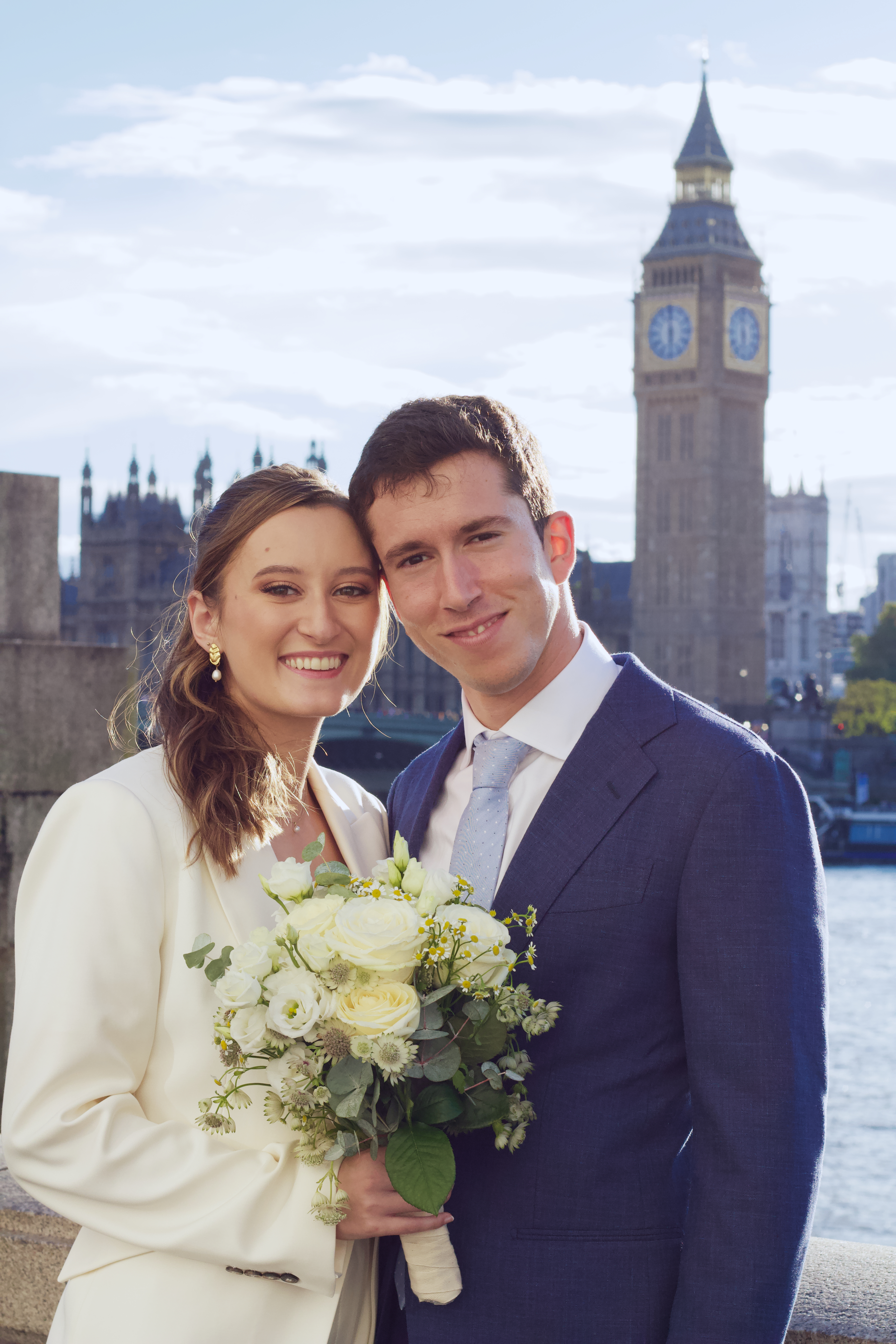 Newlyweds on the Thames with Big Ben behind